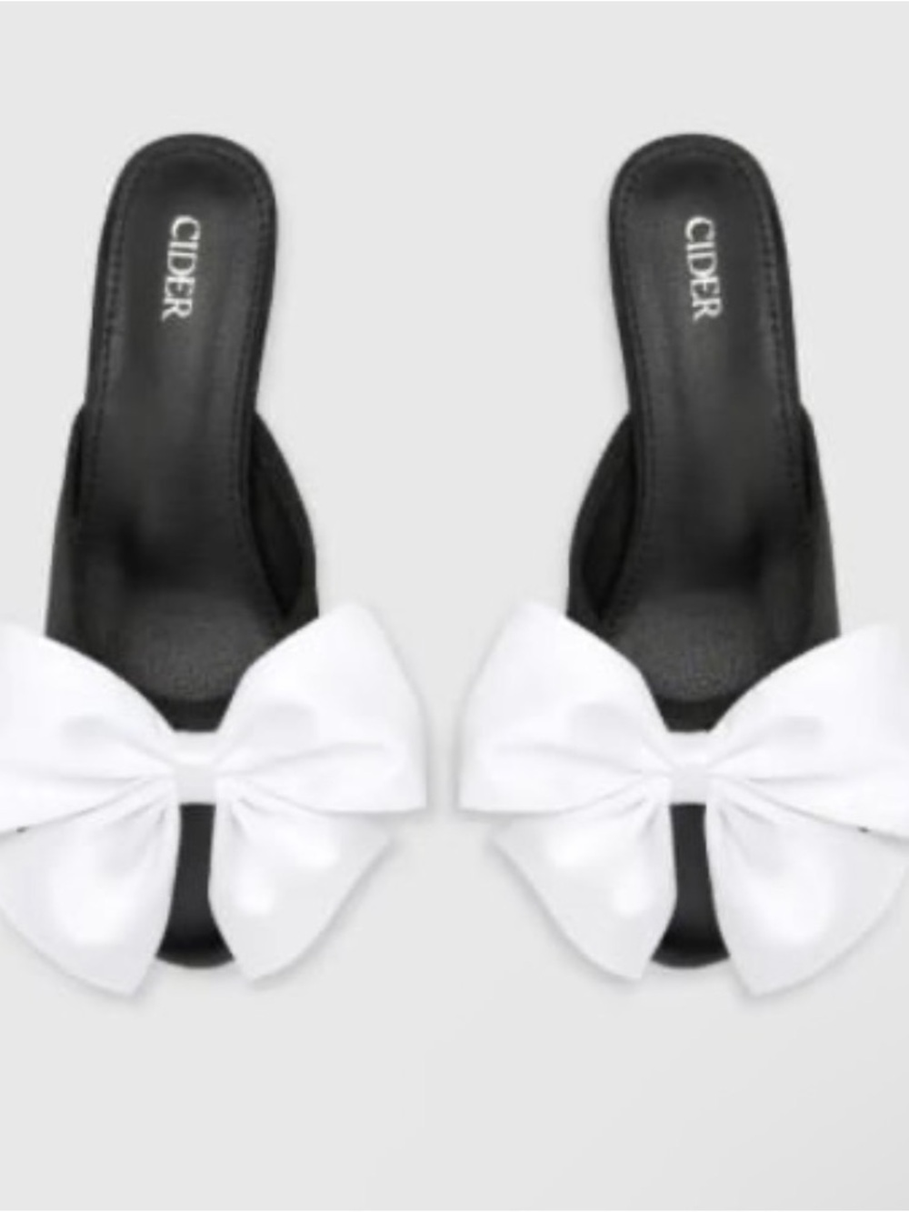 Cider Black Slide Heels with White Bow Accent